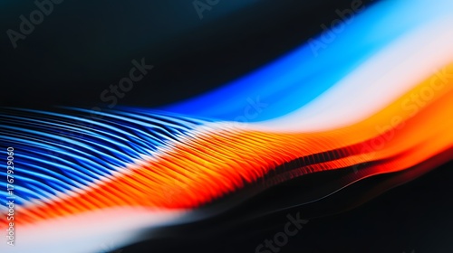 Smooth, undulating bands of vibrant blue and intense orange light flow across a dark background.