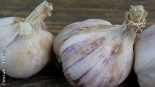 fresh garlic on a wooden background