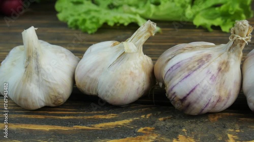 fresh garlic on a wooden background