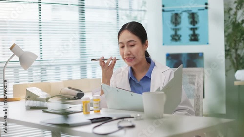 Asian female doctor holding a prescription bottle uses voice AI assistant on smartphone search for drug information. artificial intelligence in healthcare, medication verification, smart health tech.
