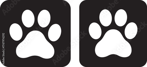 Two white paw prints on black background silhouette