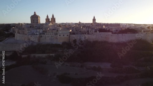 Aerial drone footage of the medieval city of Mdina in Malta a sunset