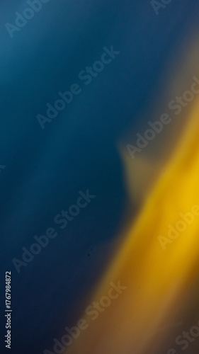 Cinematic Abstract Gradient: Deep Sapphire and Luminous Gold Light Leak
