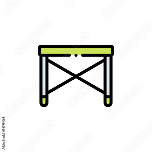 Camping table stands ready in the outdoors, offering a convenient surface for meals and activities during a peaceful camping trip.