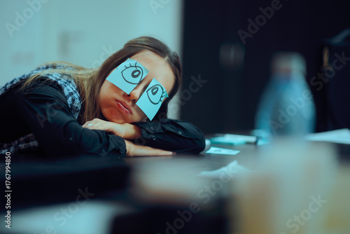 Tired Worker With Wide Eyes Drawn on Sticky Notes. Unhappy sleepy worker pretending to be awake at work

