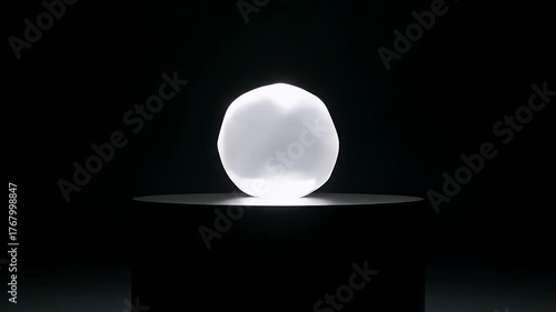 Luminous White Sphere Pulsating with Gentle Light in Darkness.