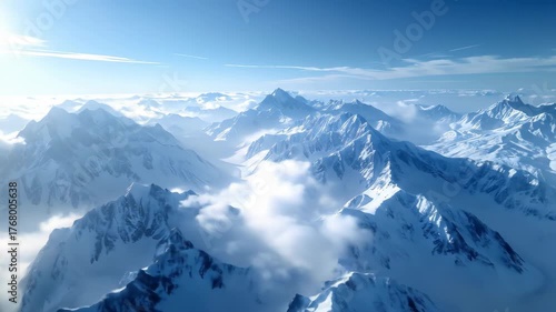 Wallpaper Mural Aerial View of Snowy Mountain Range Above the Clouds Torontodigital.ca