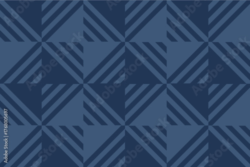 Seamless geometric pattern with chevron and diamond shapes in dark and light blue tones, creating a modern tribal textile or wallpaper design.