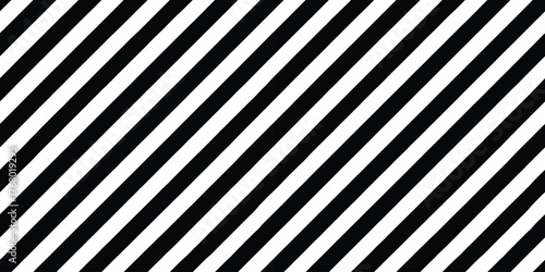 A dynamic pattern of bold black and white diagonal stripes creating an energetic visual.