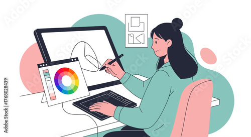 Creative digital artist working on design project with a graphic tablet and computer setup