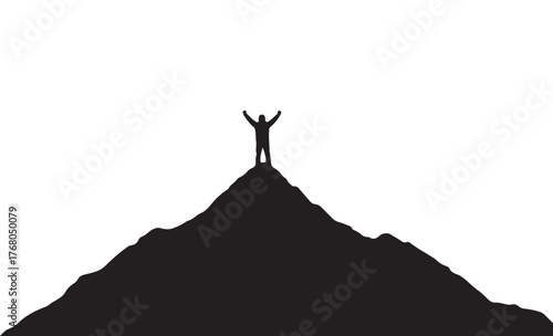 silhouette of a man standing on a rock