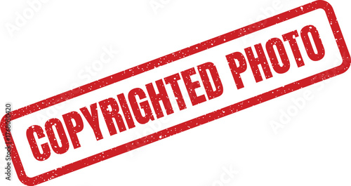 A rustic red stamp impression showcasing the words COPYRIGHTED PHOTO at an angle, representing exclusive image rights