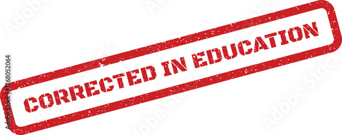 Distressed rectangular rubber stamp indicating a formal correction applied within an educational setting