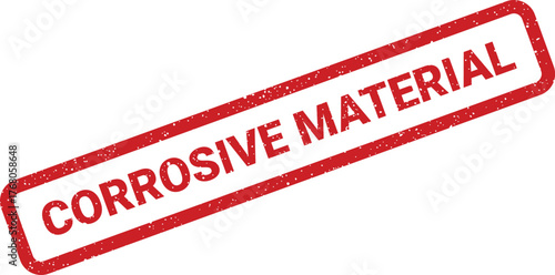 Grungy red rectangular stamp impression displaying the warning text CORROSIVE MATERIAL for safety labeling