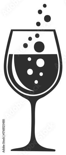 Sparkling wine glass with bubbles rising upward against a white background