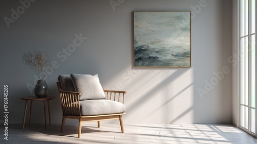 armchair. A minimalist living room corner featuring a modern armchair and abstract art in a clean, Scandinavian style. lifestyle magazines.