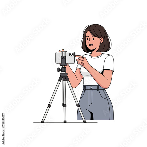 Young woman recording a video with a smartphone on a tripod, creating content for social media