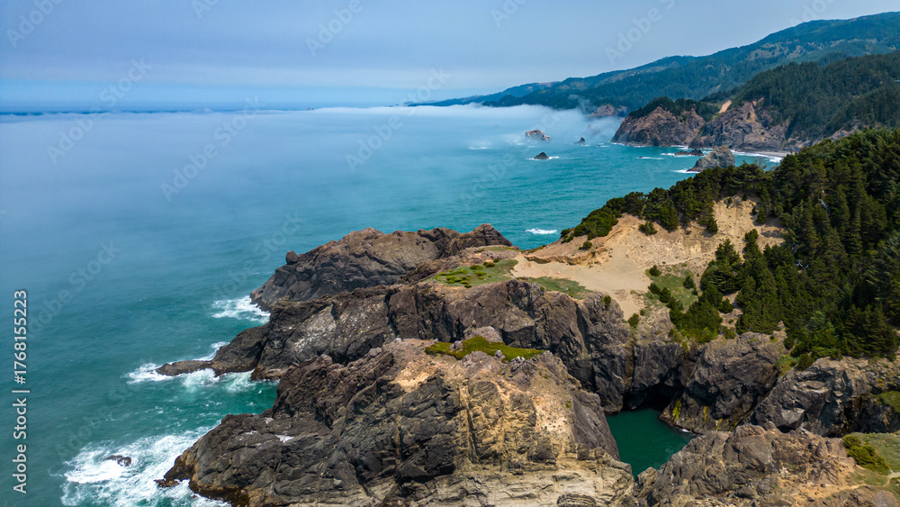 Fototapeta premium Aerial photo of Oregon rocky coast along Samuel H Boardman sceni corridor