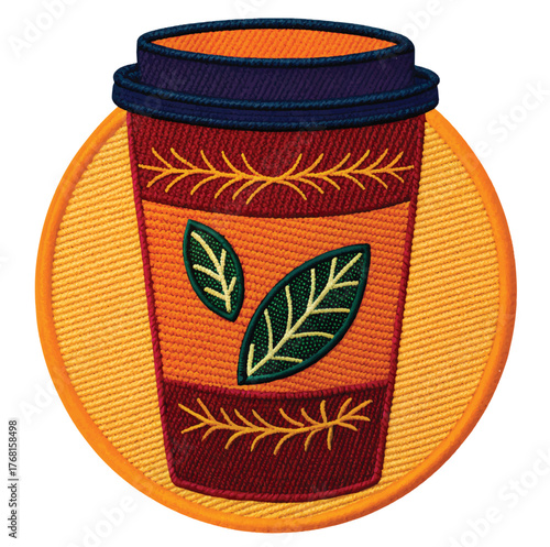 Cozy embroidered coffee cup with leaf accents, perfect for cafe menus, autumn promotions, and warm beverage designs with a rustic touch.
