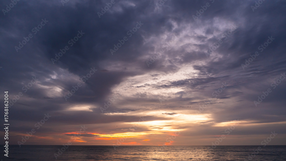 Obraz premium Dusk Sky, Sunset over sea after sundown with Pink, Red, range, Purple sunlight, Twilight horizon sea ocean sky Horizon landscape sun dawn beautiful background