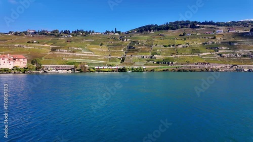 Real-Time 4K Video of Lavaux Vineyards with Lake Geneva, Mountains, and Train in Switzerland. UNESCO World Heritage Site. 