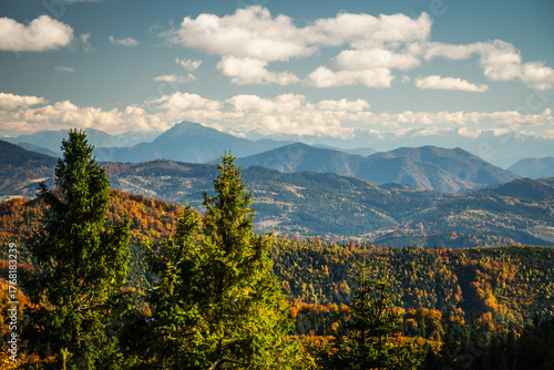Fototapeta Naklejka Na Ścianę i Meble -  The mountains are covered in trees and the sky is cloudy - vew from Wielka Racza in Beskids Mountains, Poland.