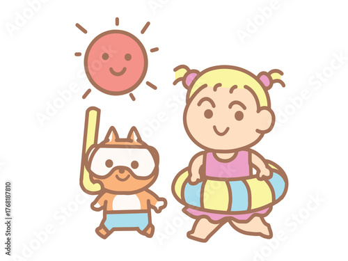 A little girl in a swimsuit with her cat