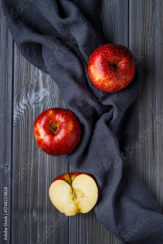 Wallpaper Mural juicy ripe red apples on a dark background Torontodigital.ca