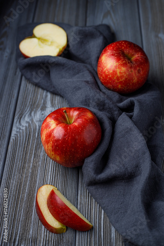 Wallpaper Mural juicy ripe red apples on a dark background Torontodigital.ca