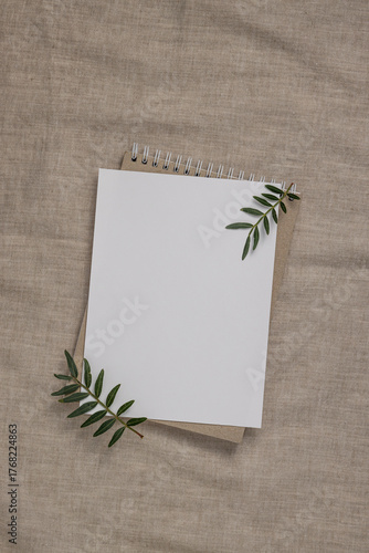 Wallpaper Mural Summer wedding stationery mock-up scene. Blank greeting card, craft paper envelope and green branches on linen textile background. Torontodigital.ca