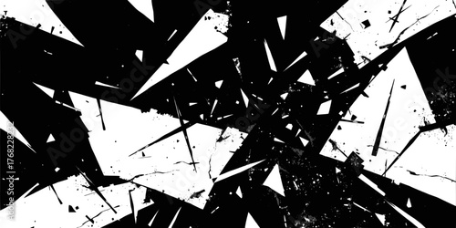Abstract black and white grunge texture with geometric shapes and sharp splatters