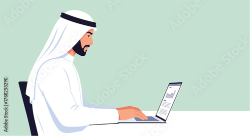 Man in traditional arab clothing working on laptop at desk in bright office focused on data analysis and business strategy.