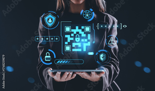 Businesswoman holding tablet with digital QR code and cybersecur