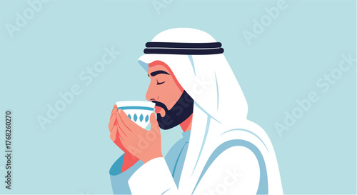 Arab man in traditional clothing drinks coffee from ornate cup against blue backdrop, showcasing cultural tradition and serene moment.