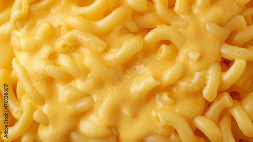 Creamy macaroni and cheese close-up with rich yellow color.