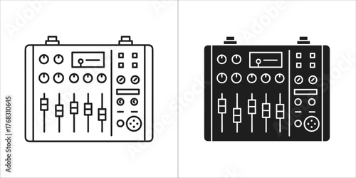 Audio mixer console with faders and knobs