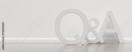 Q&A, questions and answers, white text letters offset standing in white room with wooden floor, business questions and answers concept