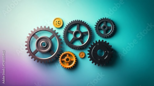 Several precision gears of different sizes and colors interlock with each oth...