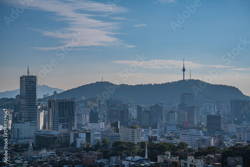 Photography Seoul's Namsan Tower and its surrounding cityscape during the autumn day