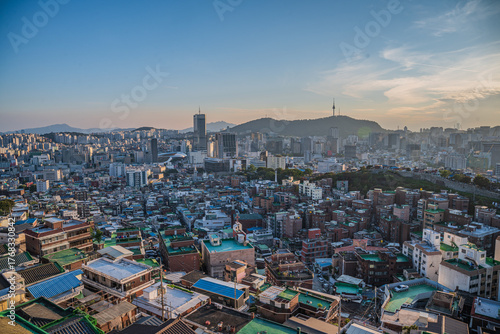 Photography Seoul's Namsan Tower and its surrounding cityscape during the autumn day