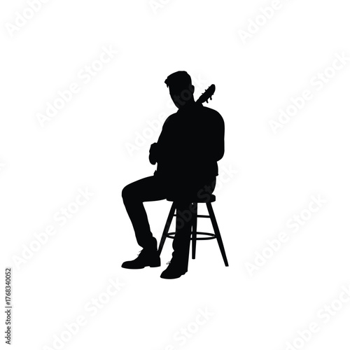 
Country musician silhouette with acoustic guitar