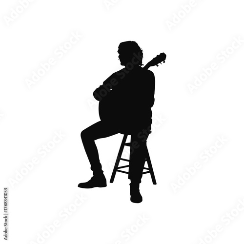 
Country musician silhouette with acoustic guitar