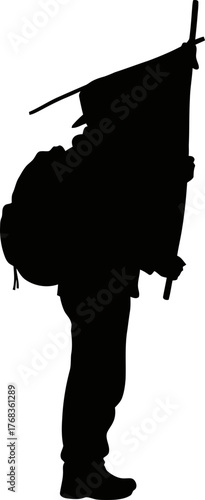 solitary figure with staff, charting an independent course toward the horizon