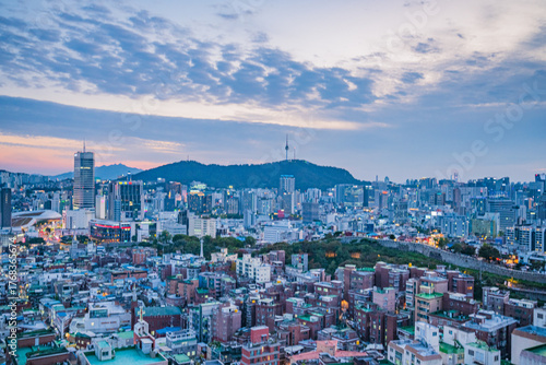 Photography Seoul's Namsan Tower and its surrounding cityscape during the autumn day