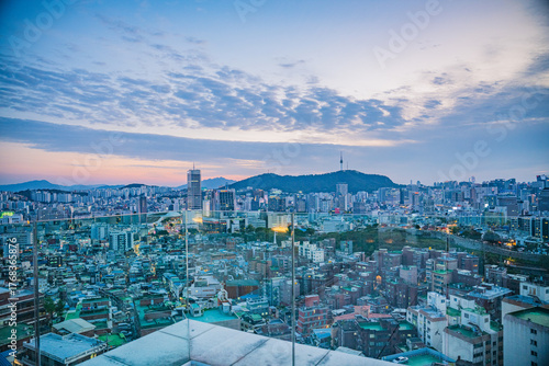 Photography Seoul's Namsan Tower and its surrounding cityscape during the autumn day