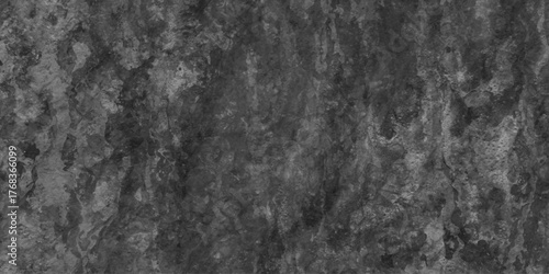 Black stone concrete grunge texture and backdrop  anthracite panorama,  black and white decorative plaster abstract grey color design, light with gradient background, old loft style raw concrete wall.