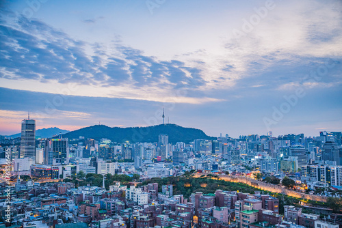Photography Seoul's Namsan Tower and its surrounding cityscape during the autumn day