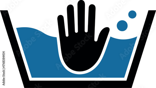 A hand is shown washing in a tub of blue water with bubbles.