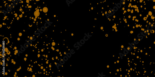 Abstract background with gold glitter on black, gold paint splatter on a black  elegant decoration for celebrations, with falling confetti and light effects, Defocused lights with a beam of light.