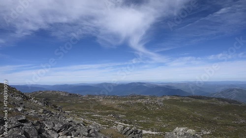 view over the mountain range at mount Mount Kosciuszko the highest elevation in the Australian Alps and mainland Australia, part of the great dividing range and popular travel destination.